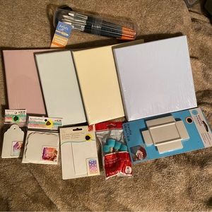 Canvas, paintbrushes, squeegee, doing pouncers, watercolor tag & cards